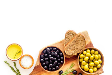 Sliced bread ciabatta with olives and oil. Greek or Italian meal