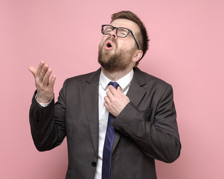 Man In A Business Suit, Pleading And Looking Up Inquiringly, He Did Not Have A Deal, He Is Upset And Chokingly Tries To Loosen Tie. 