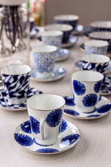 set of blue tea mugs with blue pattern
