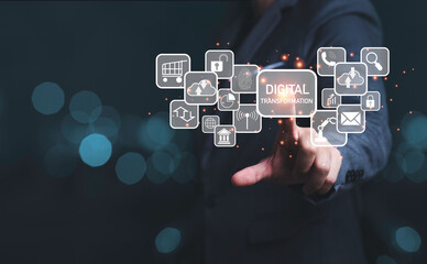 Businessman touching to virtual screen of digital transformation wording and icons, business...