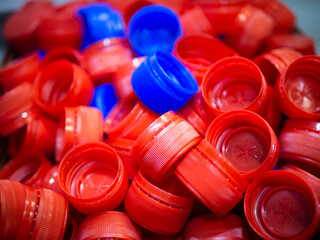A group of many types of plastic colorful caps.