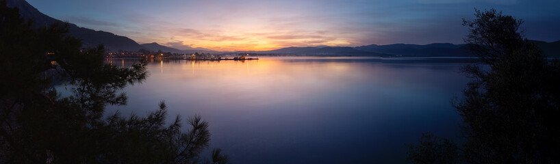 Fototapeta premium Panorama of Gokova Bay in Akyaka village at foot of Sakartepe Mountain at sunrise