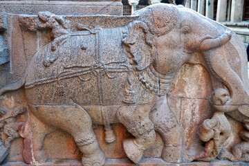 Elephant sculpture carved in the stone walls of ancient Brihadeeswarar temple in Thanjavur, Tamilnadu. Indian rock art relief animal sculpture.