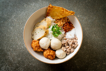 spicy small flat rice noodles with fish balls and shrimp balls without soup