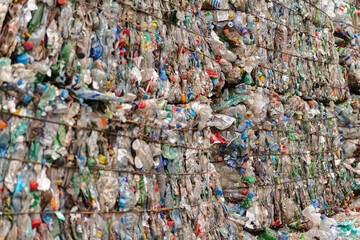 Bales of plastic bottles after the press. Sorting garbage plant in the Moscow region.