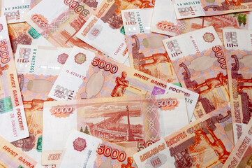 A lots of russian 5000 roubles banknotes background.