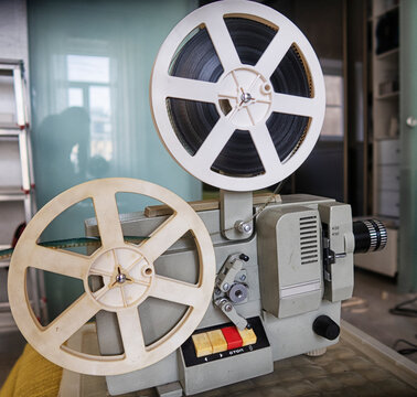 A vintage 8mm movie projector. close up
