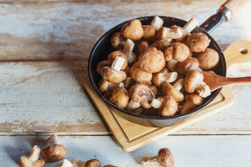 .Fresh shiitake mushrooms in a pan for cooking