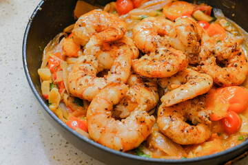 Marinated organic shrimp scampi dish 