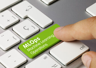 MLOps Machine Learning Operations - Inscription on Green Keyboard Key.