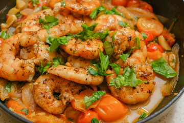 Marinated organic shrimp scampi dish 