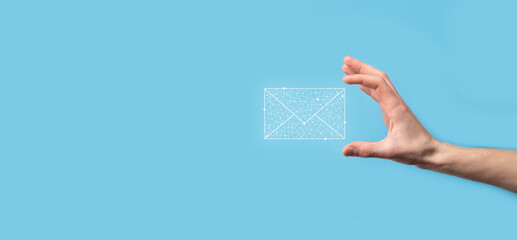 Male hand holding letter icon,email icons .Contact us by newsletter email and protect your personal...