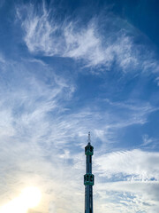 tower of the mosque with blue sky in the morning. 