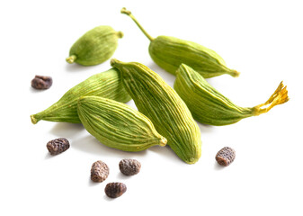 Cardamom pods and seeds isolated on white background
