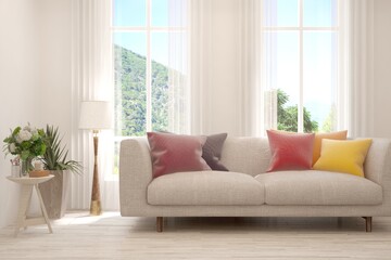 Minimalist living room in white color with sofa and summer landscape in window. Scandinavian interior design. 3D illustration
