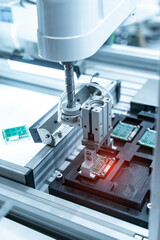 automatic robot for print circuit board (PCB)assembly machine during soldering or welding part at factory