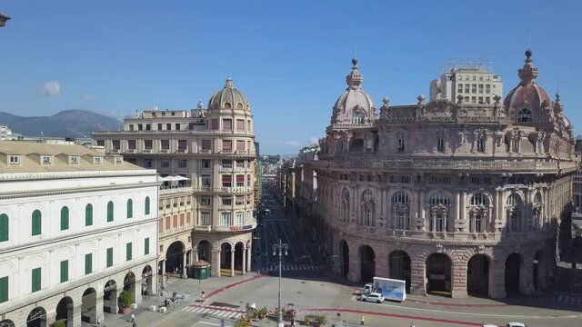 Aerial panoramic drone view of De Ferrari square in Genoa, Italy. Central part of the city, aerial view. In the background the Palazzo della Borsa and buildngs. 4K video