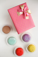sweet dessert. macarons, gift box and a bouquet of flowers. 