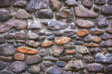 wall of ancient stone after restoration