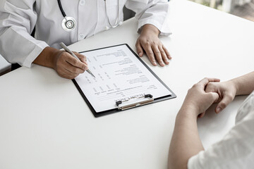 The doctor and the patient are discussing the details of the treatment, the results of the physical...