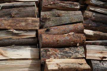 a dry chopped firewood stacked like wall