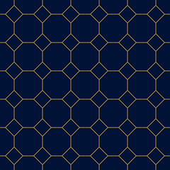 Geometric golden ornament grid on blue background. Seamless fine abstract pattern, wrapping paper