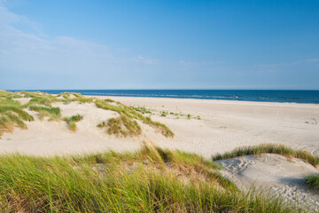 Fototapeta na wymiar Beach view from the sand dunes