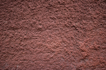 A brown cement wall. Brown texture background.