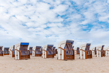 Deserted beach, locked beach chairs in Warnemuende near Rostock on the Baltic Sea, Germany - 425590448