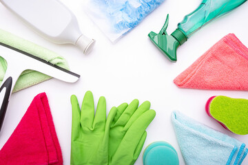 brushes, rags, liquids and gloves for cleaning the house