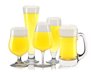 Set of fresh light beer glasses with bubble froth isolated on white background.