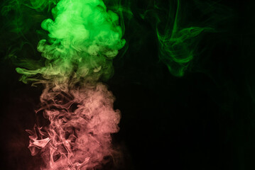 Green and pink steam on a black background.
