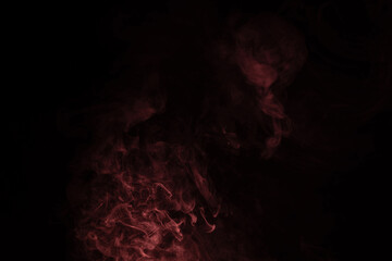 Yellow and pink steam on a black background.