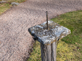 Sundial made of stone very weathered. Shot in Sweden, Scandinavia