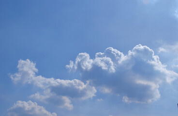 Blue sky with a cloud.