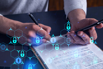 A businessman in casual wear signing the contract to prevent probability of risks in cyber...