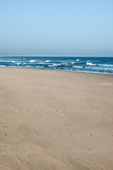 The deserted beach, sky, sea and sand