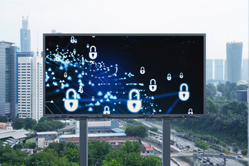 Padlock icon hologram on road billboard over panorama city view of Kuala Lumpur at day time to protect business, Malaysia, Asia. The concept of information security shields.