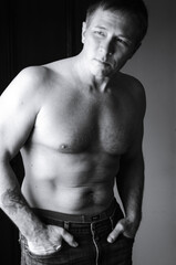Fototapeta na wymiar black and white mature man shirtless
