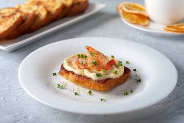 Bruschetta with shrimps, mayonnaise and micro greens. Healthy eating concept