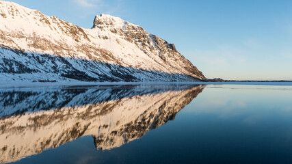Mountain reflected in the shape of an arrowhead, Steirapollen, Lofoten Islands, Norway