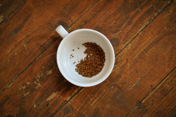 Brewed coffee cup on brown background