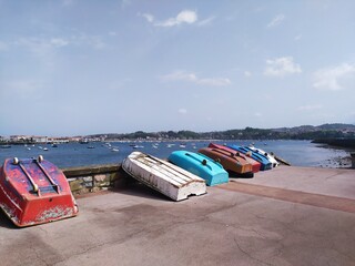 fishermen boats of different colors in the port of Hondarribia, a coastal town in the Basque Country 