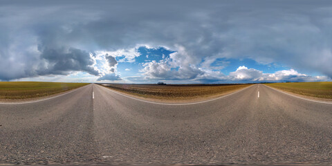 full seamless spherical hdri panorama 360 degrees angle view on asphalt road among fields in nasty day with overcast sky in equirectangular projection, ready for VR AR virtual reality