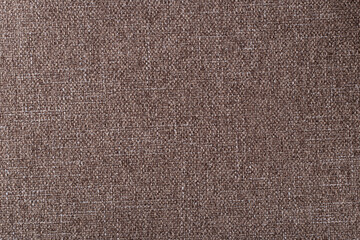 smooth surface of dense coffee-colored upholstery fabric with linen texture, background
