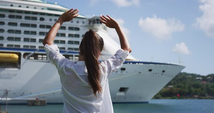 Cruise ship travel concept. Woman waving hands goodbye at cruise ship leaving. Caribbean luxury travel vacation concept. Boat port of call harbor, people greeting.