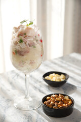 Very famous Peruvian dish that is made of chunky fish marinated in lemon and served as a starter.