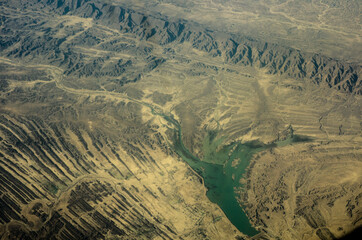 aerial view of desert mountains and canyon. Rocky geological formations. Arabian Peninsula