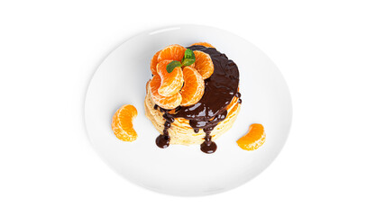 Pancakes with chocolate and tangerines isolated on a white background.