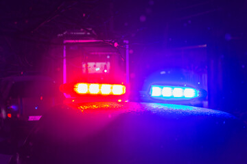 Abstract blurred background with flasher in the dark. Special signals of emergency services....